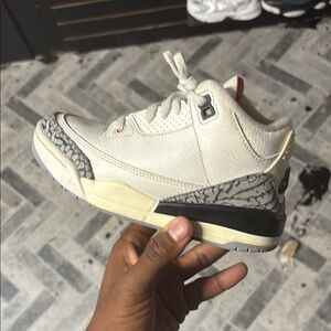 Jordan Gray and Red Sole Sneakers